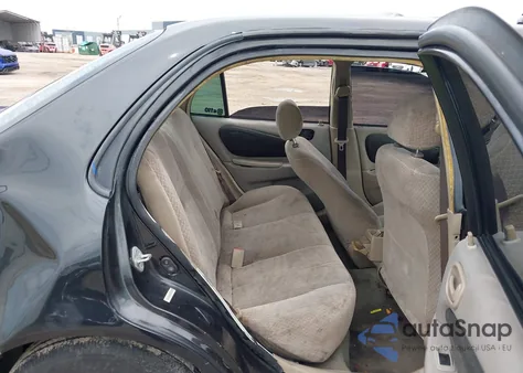 1999 Toyota Corolla Ce z USA, uszkodzony, nr VIN 1NXBR12EXXZ275998